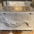 Tour Friaul 2023: Gemona: Taufbecken mit römischer Grabplatte "Delfin mit geflügeltem Genius", 1.-2. Jh. (Foto: Andreas Kuhrt)
